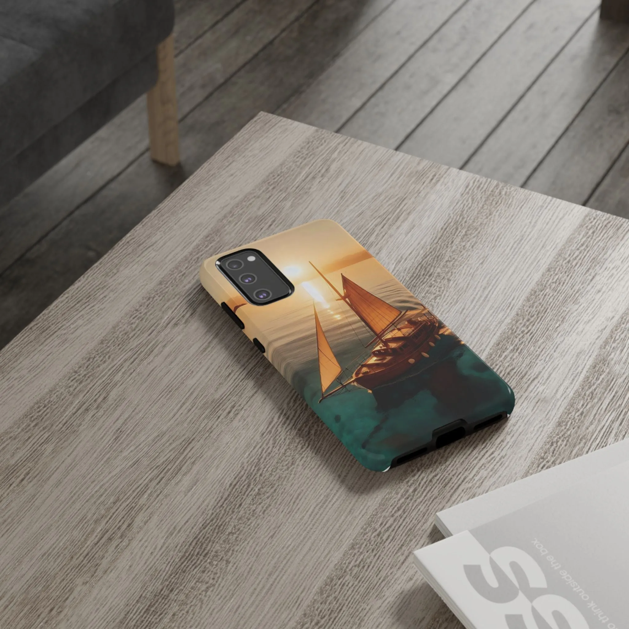 Sailing boat and sunset on a clear seaTough Cases