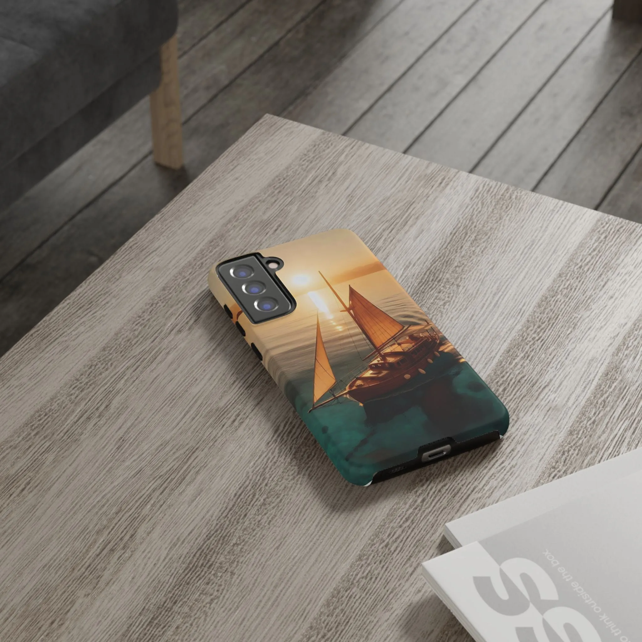 Sailing boat and sunset on a clear seaTough Cases