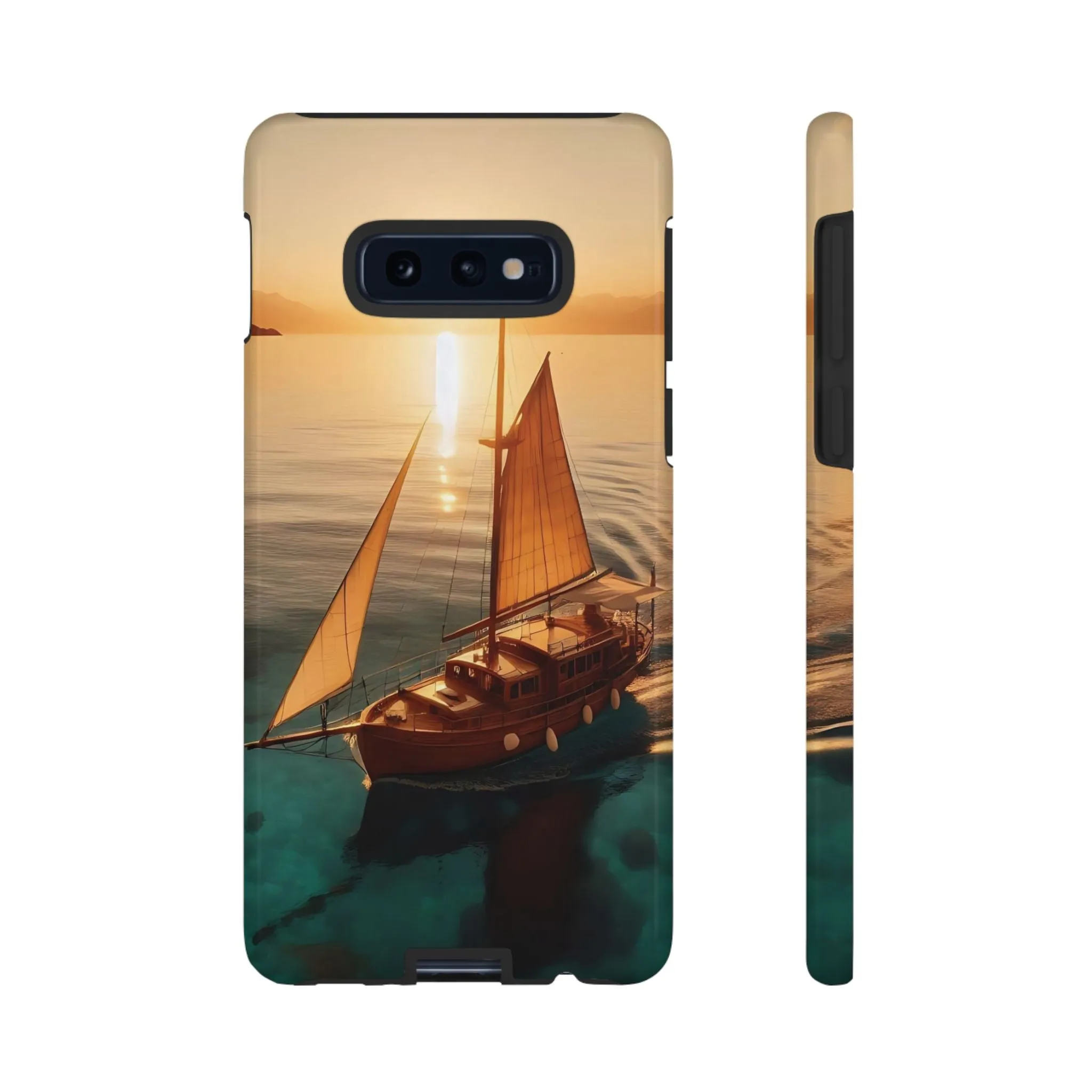 Sailing boat and sunset on a clear seaTough Cases