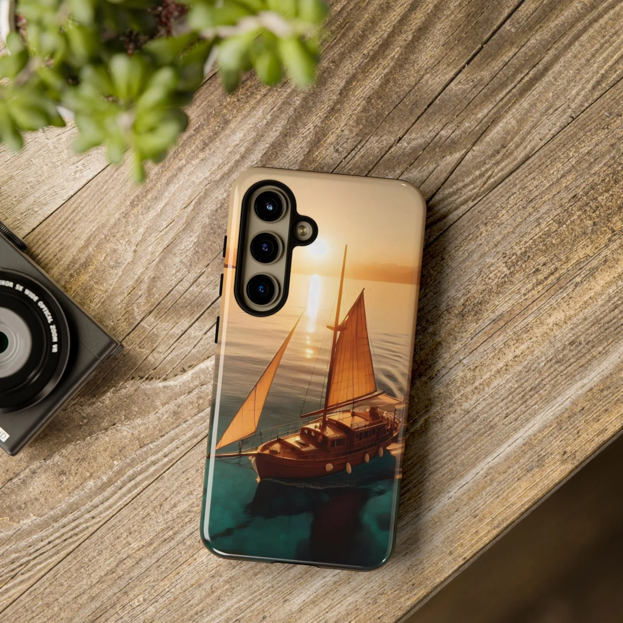 Sailing boat and sunset on a clear seaTough Cases