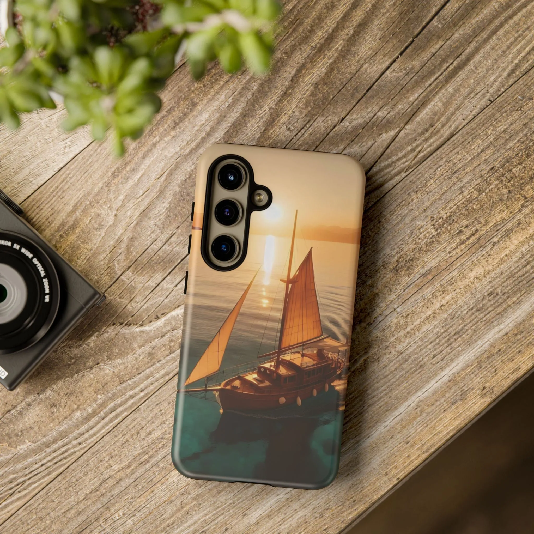 Sailing boat and sunset on a clear seaTough Cases