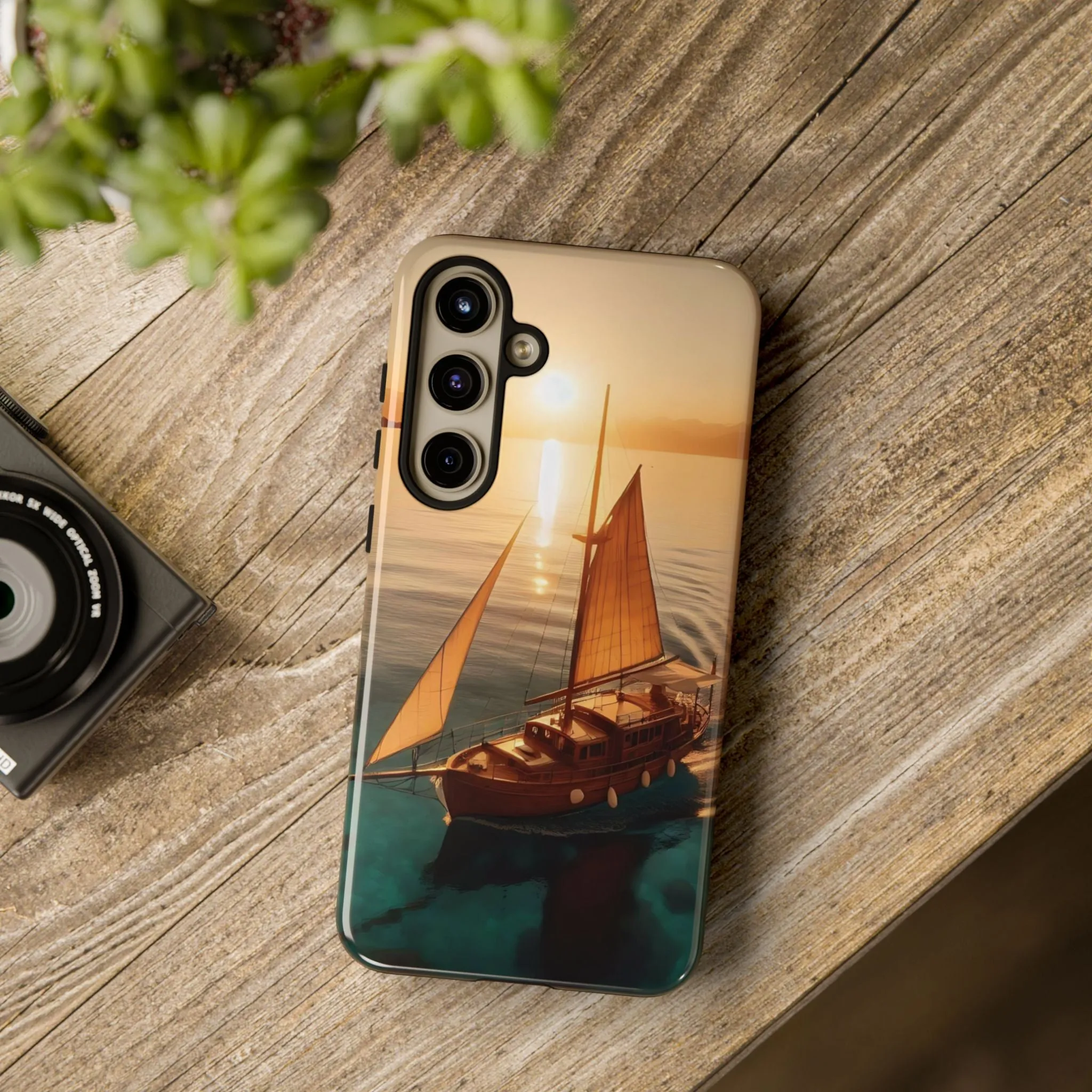 Sailing boat and sunset on a clear seaTough Cases