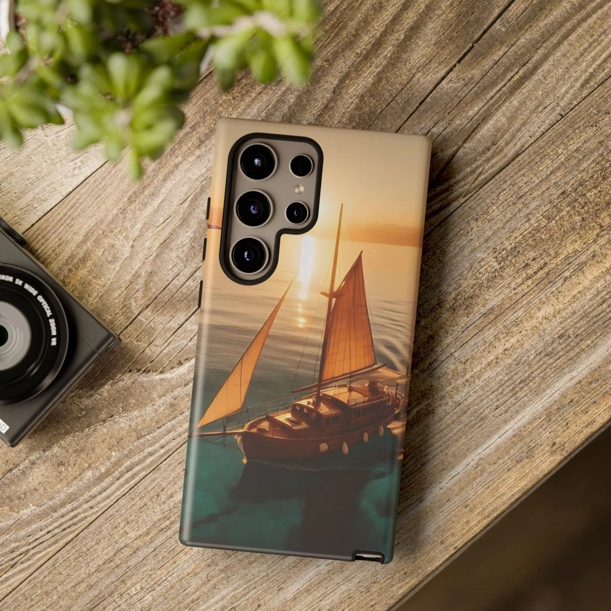 Sailing boat and sunset on a clear seaTough Cases