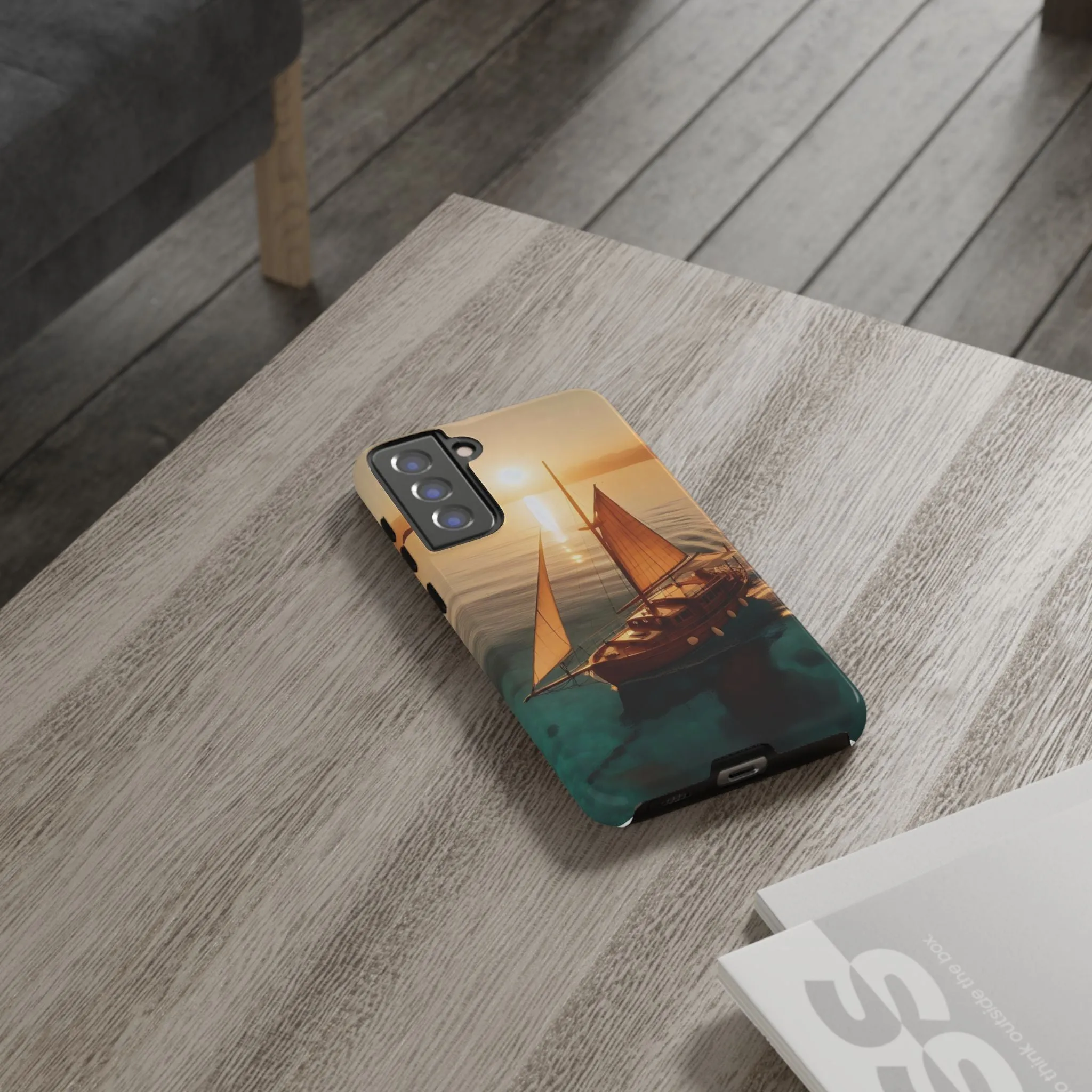 Sailing boat and sunset on a clear seaTough Cases