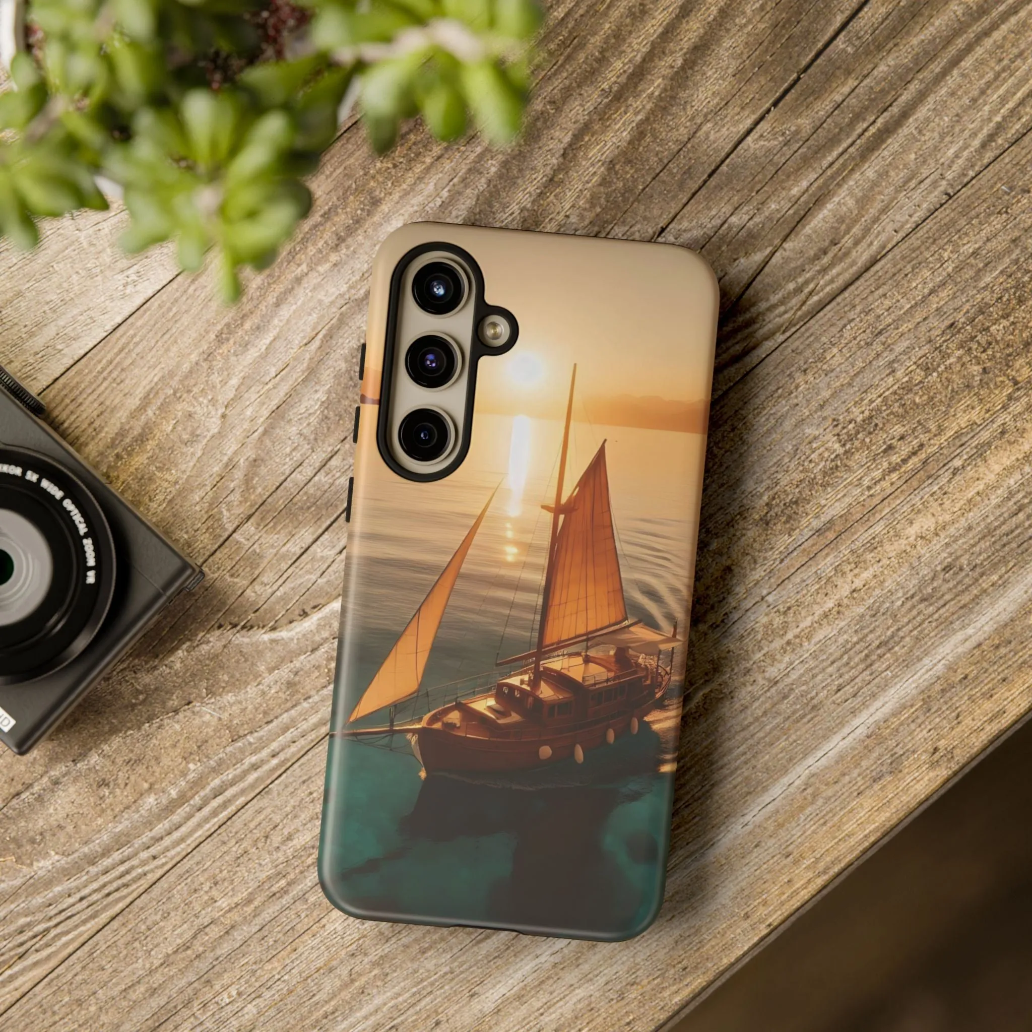 Sailing boat and sunset on a clear seaTough Cases