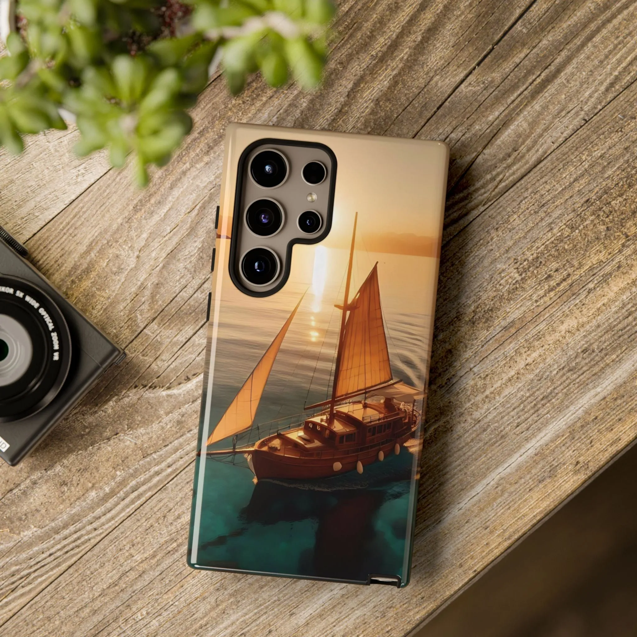Sailing boat and sunset on a clear seaTough Cases